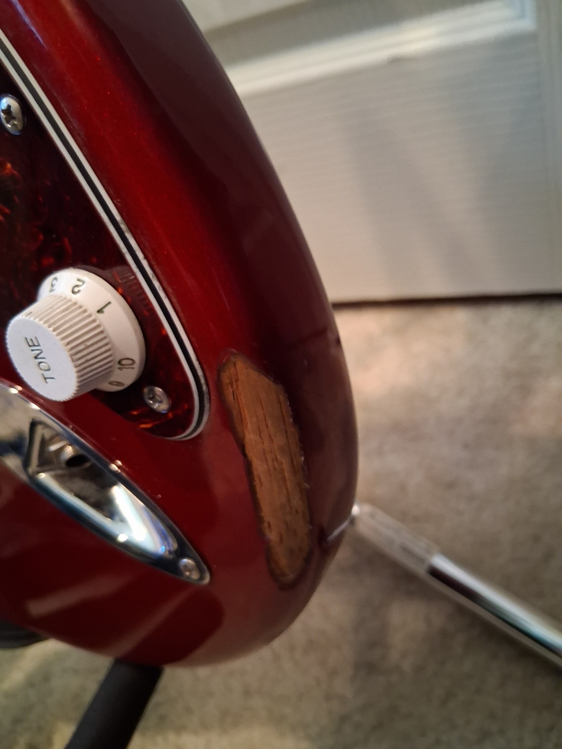 Cosmetic scuff on guitar body