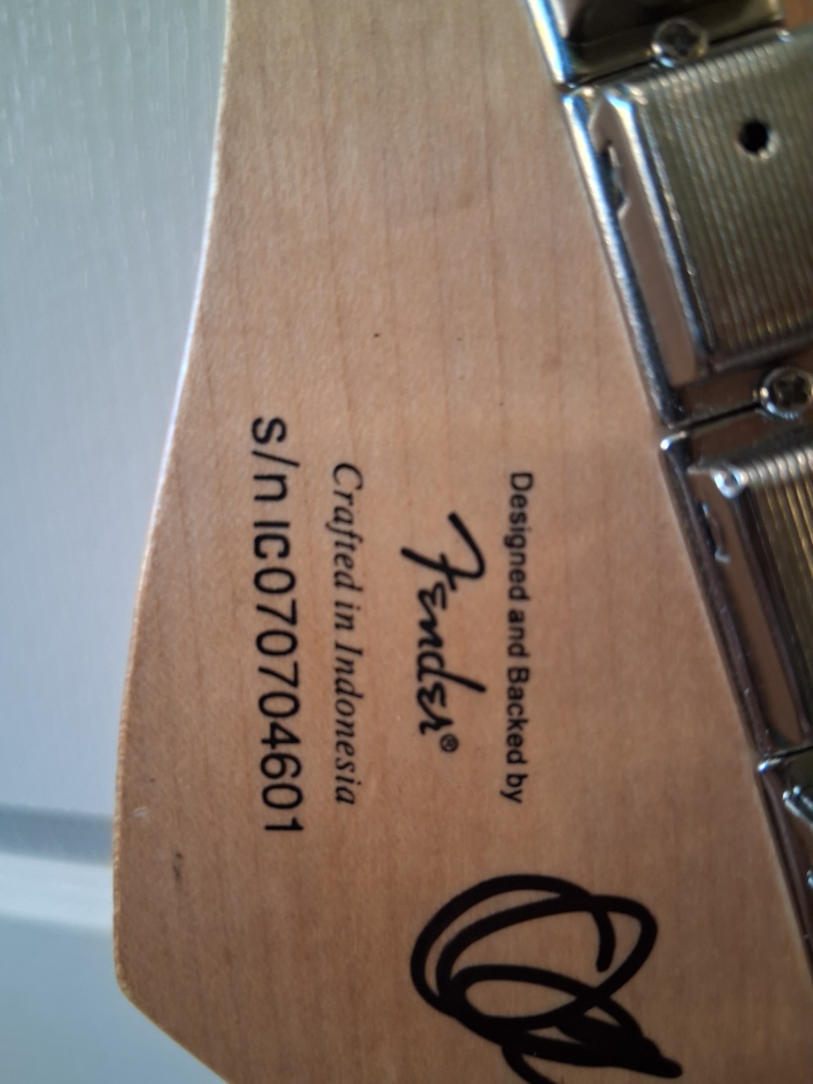 Serial number on rear of headstock
