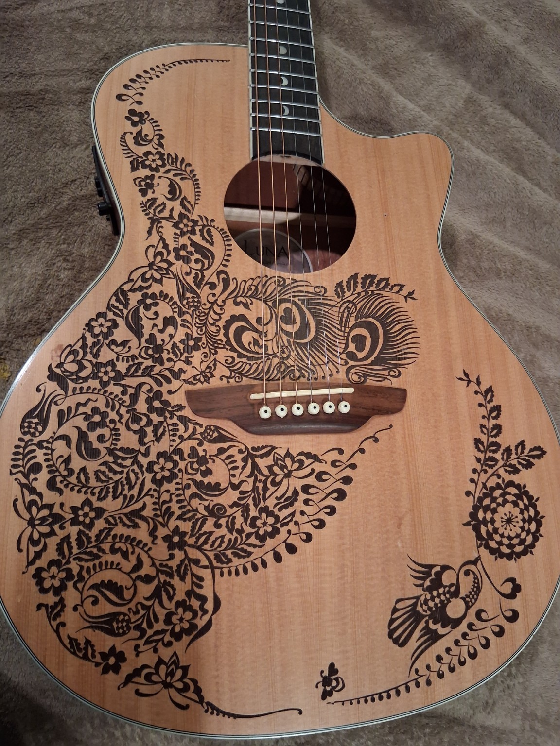 Decorated acoustic guitar
